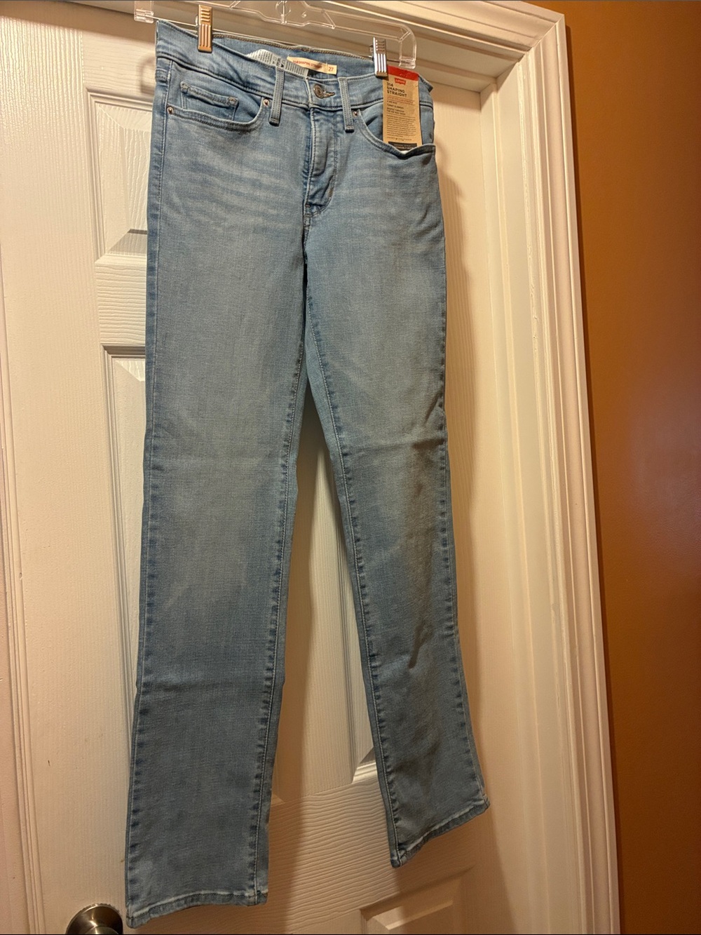 Levi’s 314 Shaping Straight Women's Jeans in classic light denim wash.